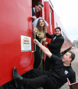 The actors on the Kansas Belle ham it up before departure.